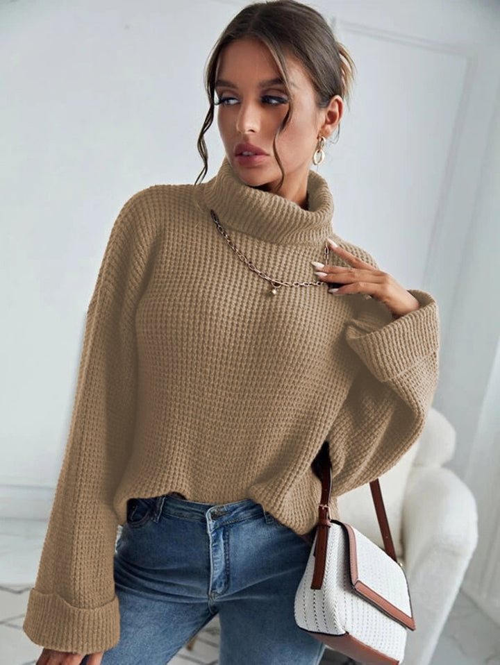 Kvinders strikkede sweater med høj krave og teksturerede ærmer Stilla