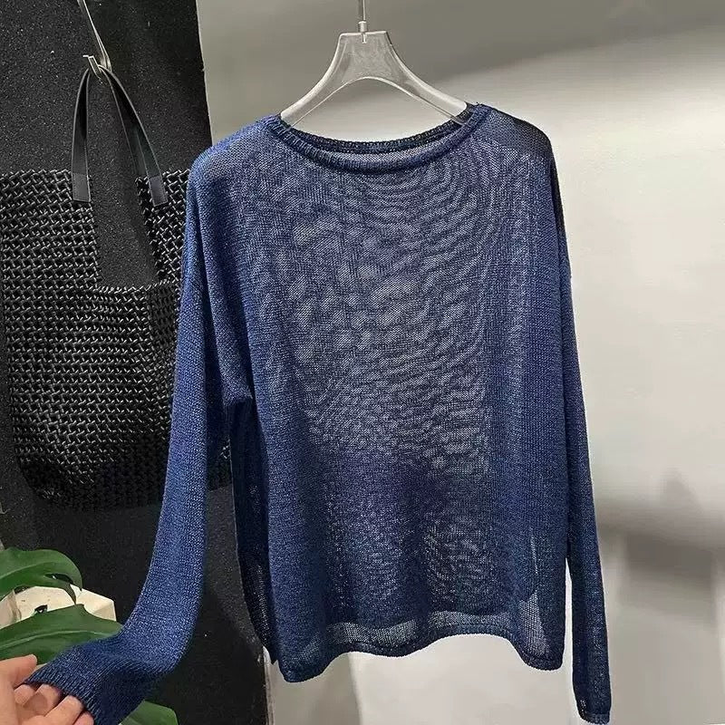 Dame afslappet, gennemsigtig sweater med løs pasform og fint strikmønster Stilla