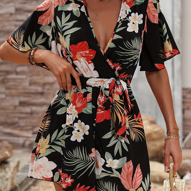 Dame jumpsuit med floralt design og vide ærmer Skovae