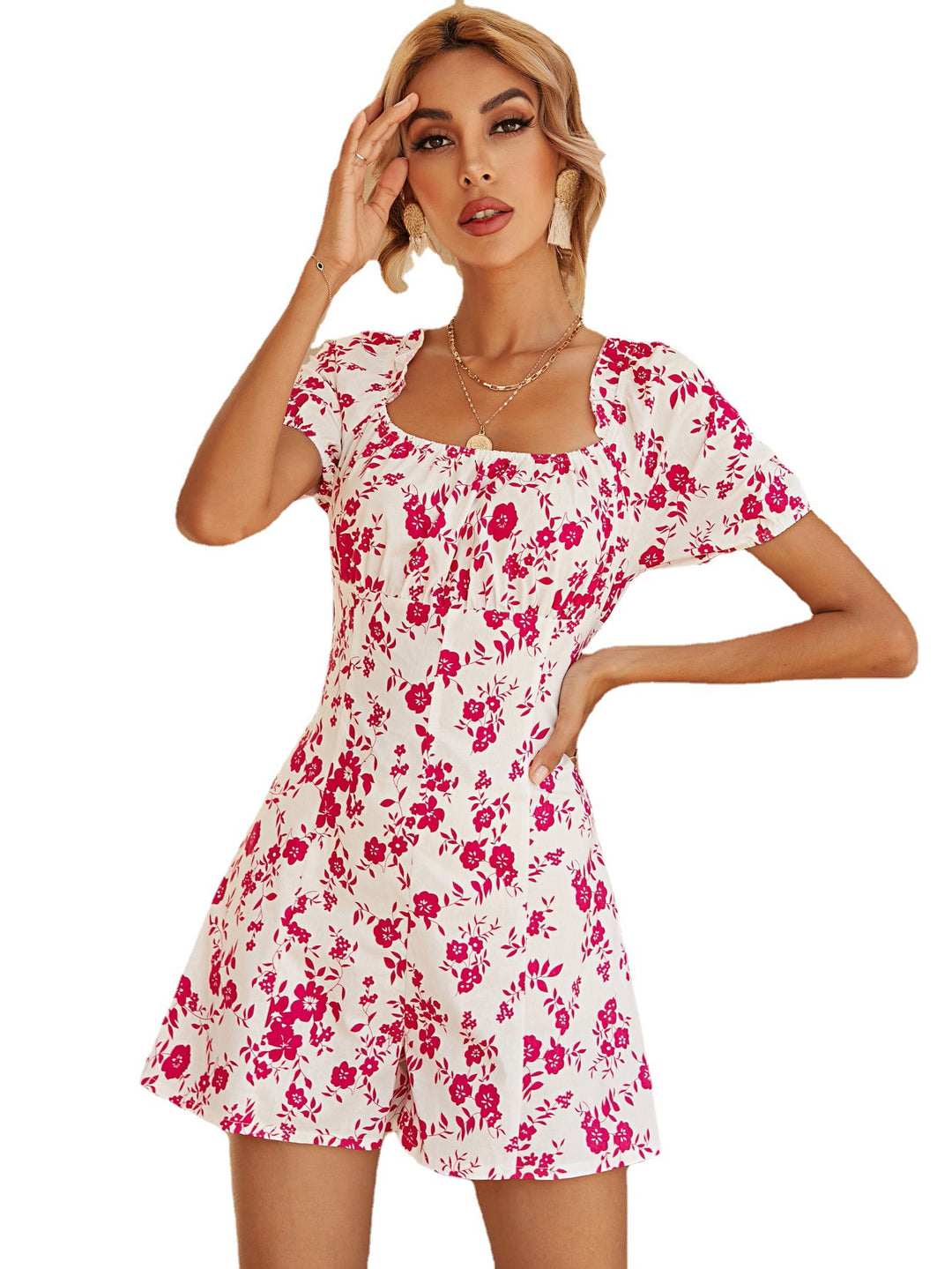 Dame Playsuit med blomsterdesign og feminine pufærmer Stilla