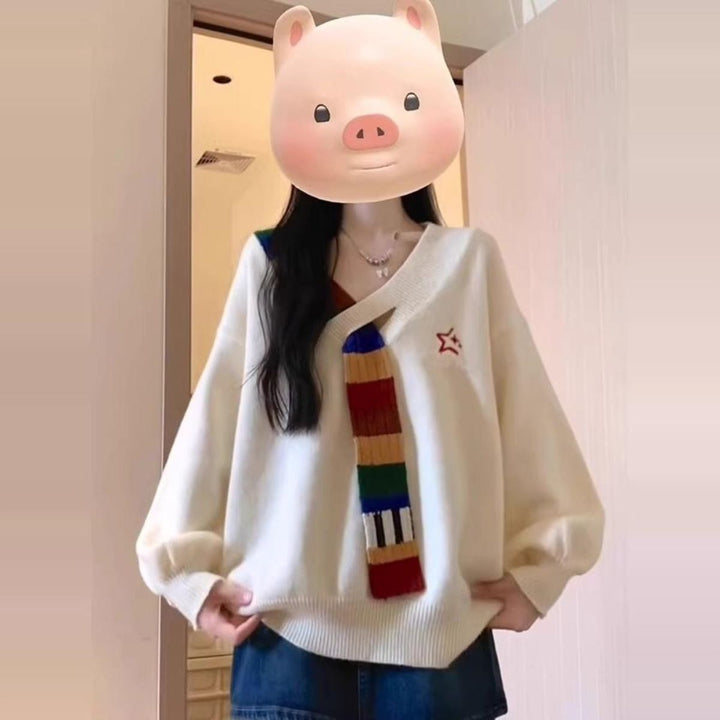 Kvinders stilfulde sweater med V-hals og farverige striber Stilla