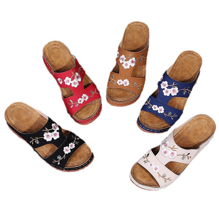 Dame Clogs med floralt broderi design og komfortabelt fodseng Stilla