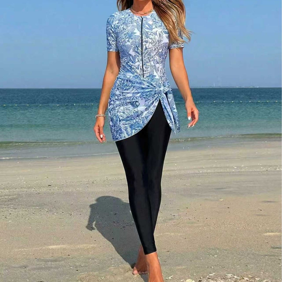 Damer sporty surfdragt med asymmetrisk snit og vildledetail Skovae