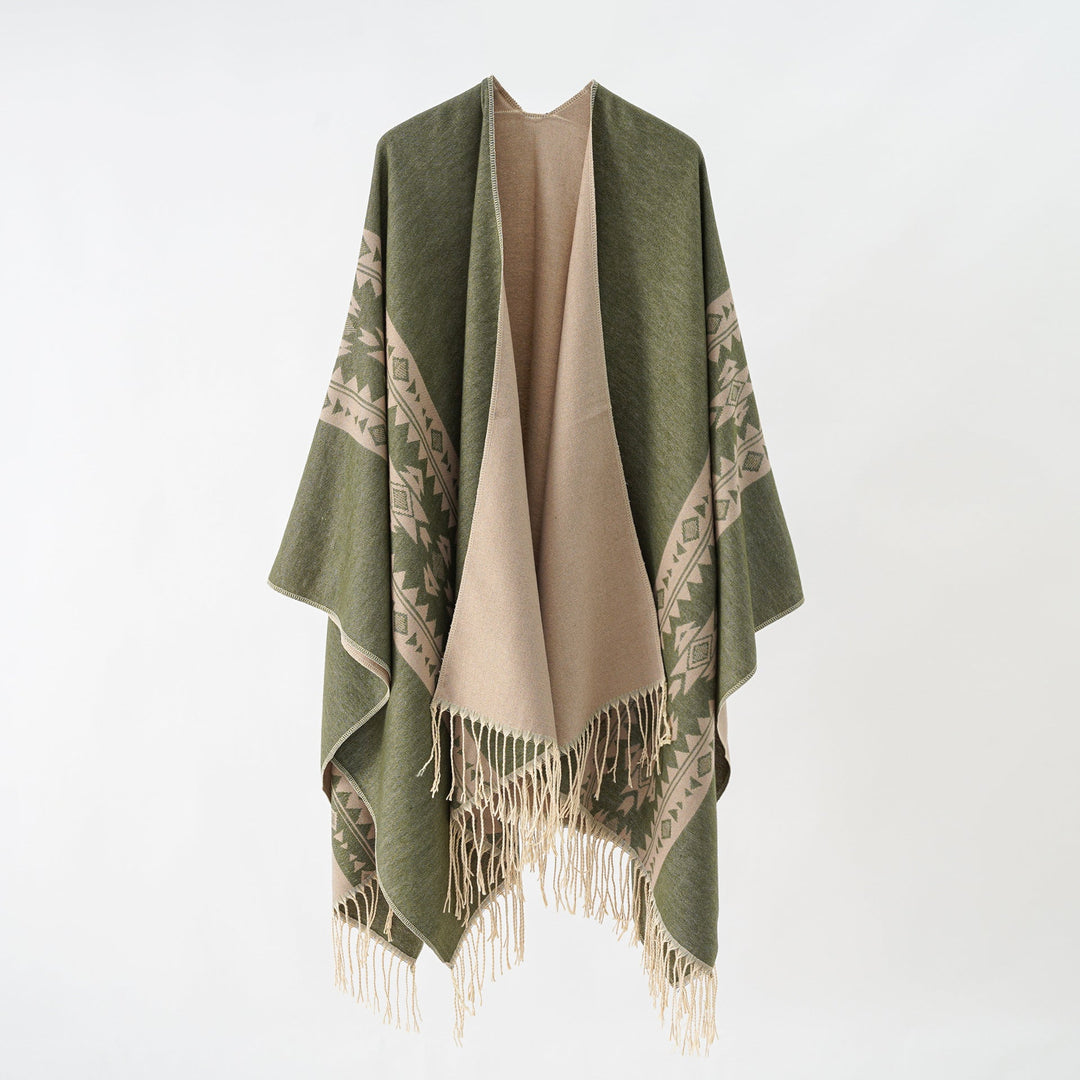 Dame Elegant Strikponcho med Kunstneriske Frynser og Blomsteragtige Accenter Skovae