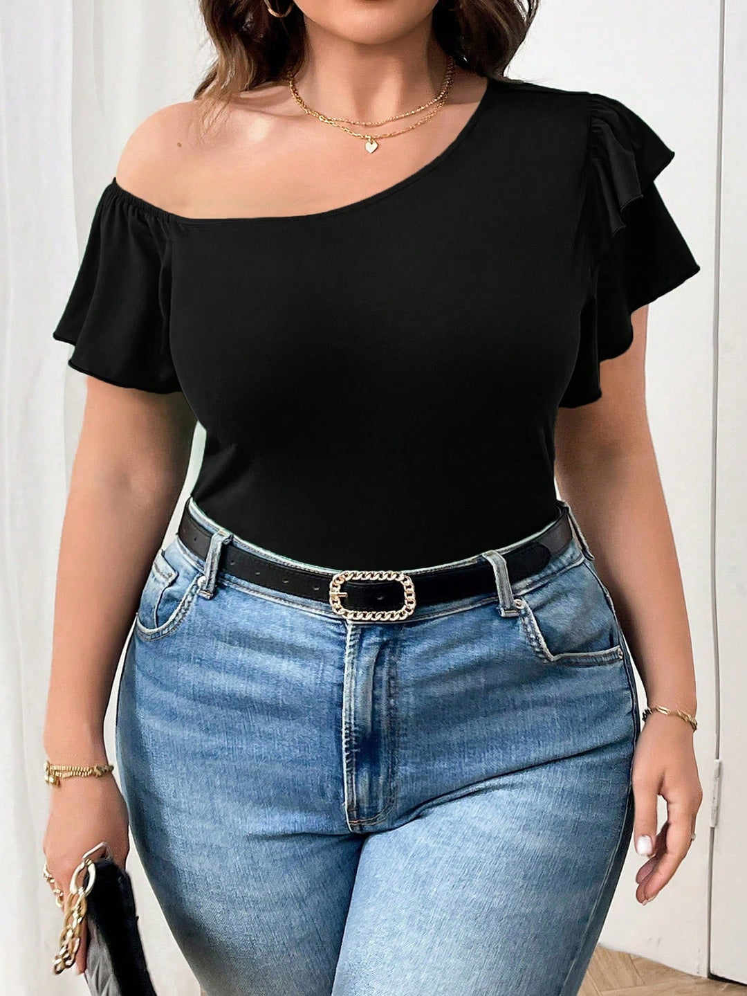 Dame asymmetrisk top med volangdetaljer Stilla