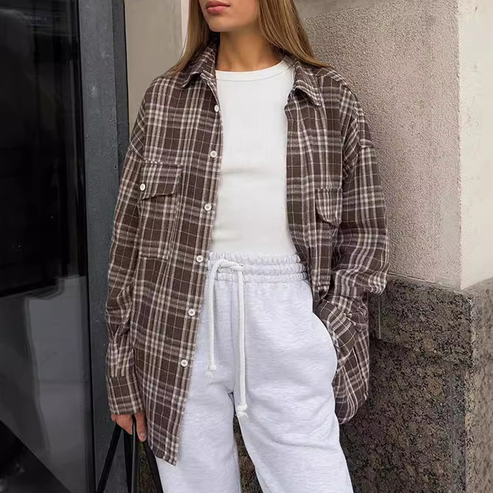 Dame ternet bluse i afslappet oversized snit med praktisk knap-design Stilla