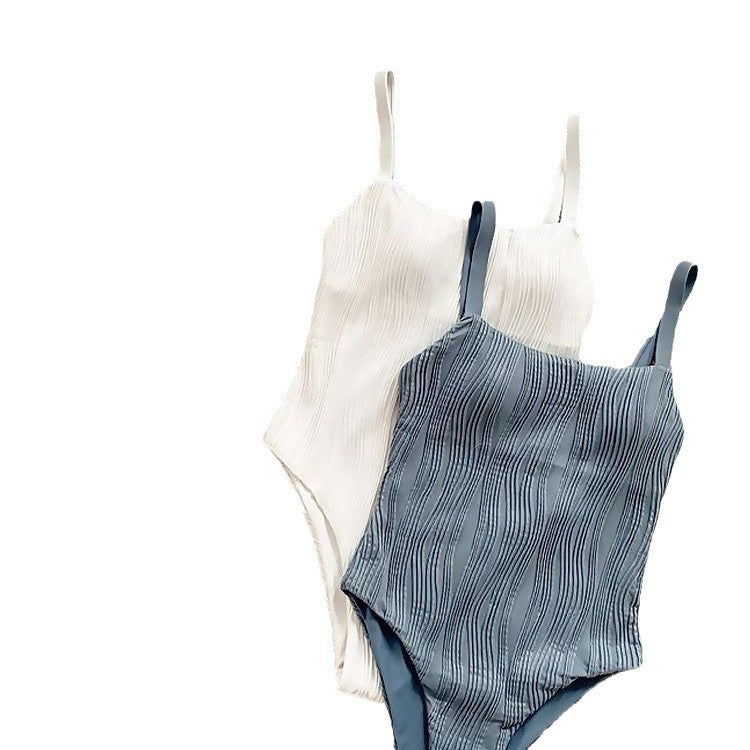 Dame Premium Éntedeler Badedragt med elegant ribdesign og justerbare stropper Stilla