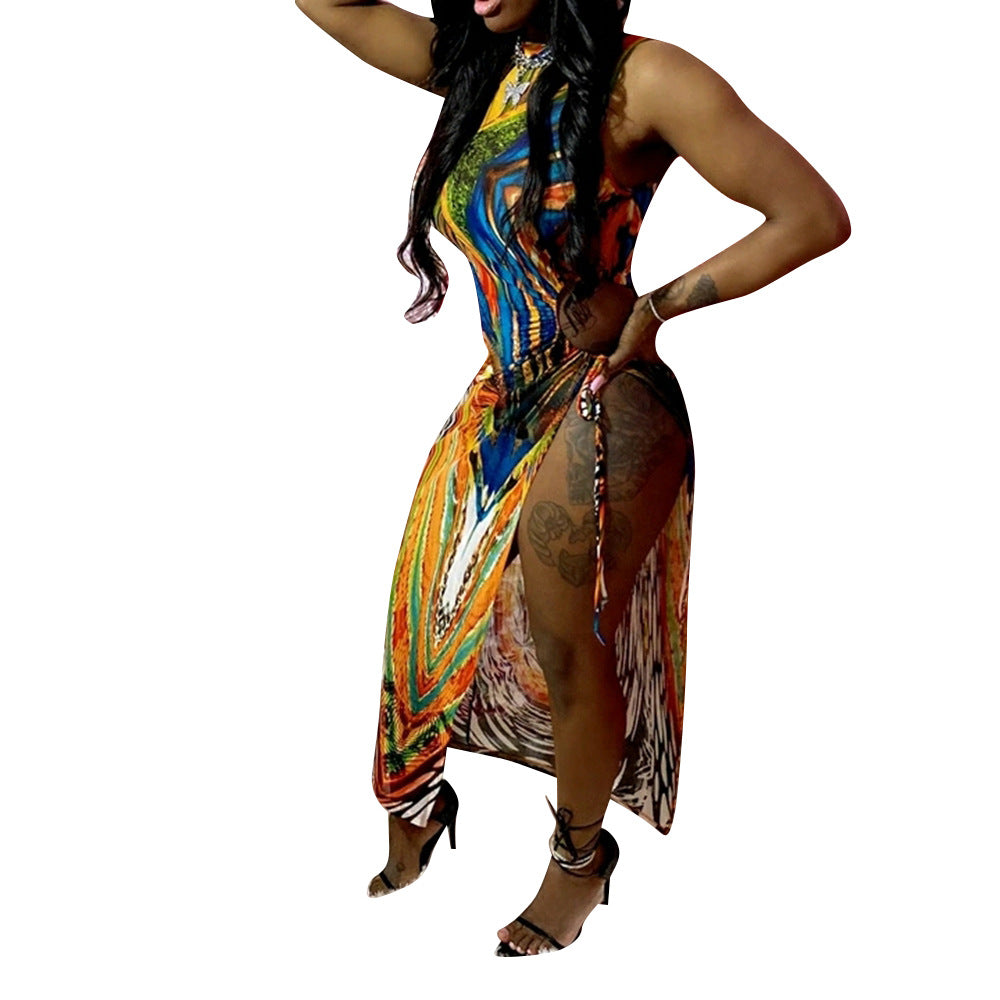 Dame Maxi-kjole med moderne asymmetrisk snit og farverigt print Stilla