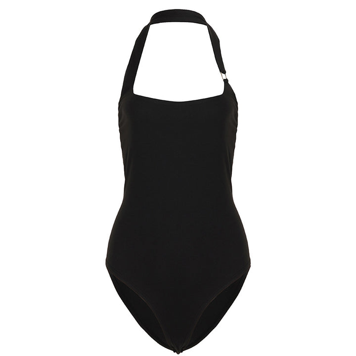 Dame badedragt med elegant halterneck-design og figursyet snit Skovae