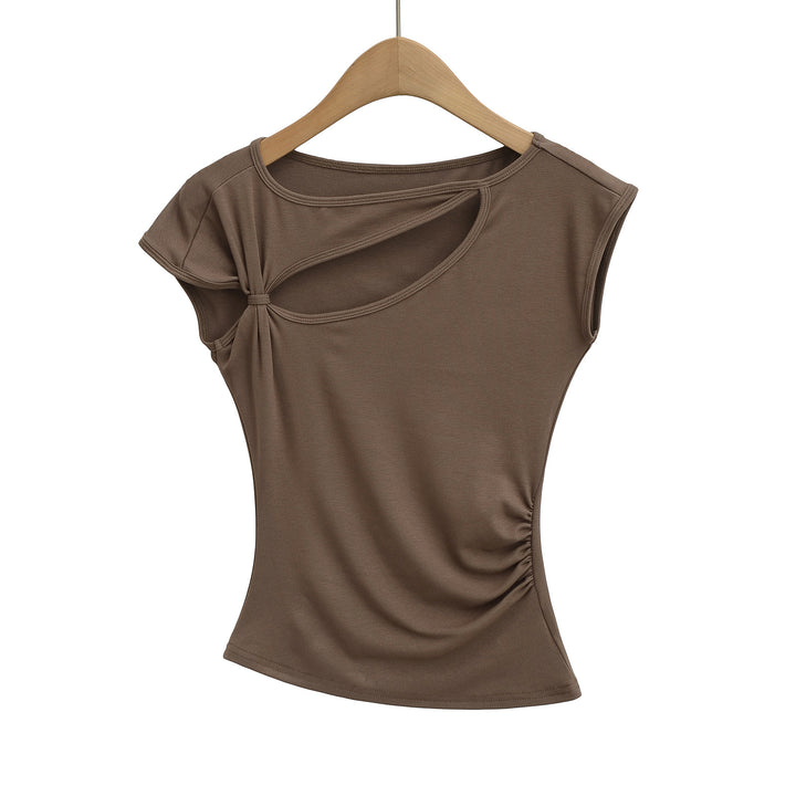 Dame sportslig top med asymmetrisk snit og modige cut-out-detaljer Stilla