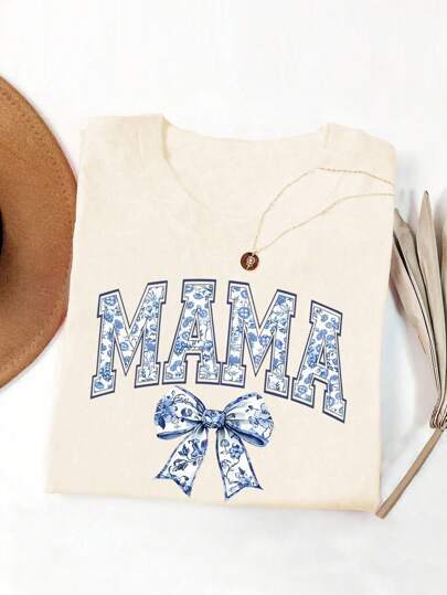 Dame T-shirt med blomster motiv og legende sløjfe dekoration Stilla
