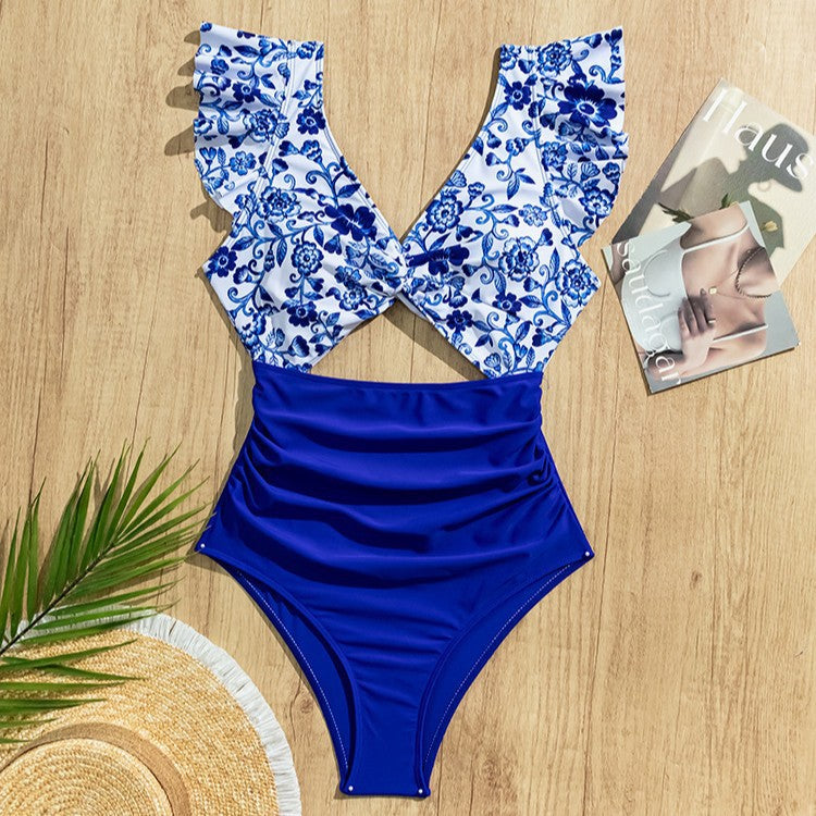 Dame en-delt badedragt med kreative cut-out designs Skovae