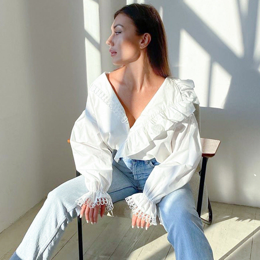 Damebluse med voluminøse flæsedetaljer og elegante ærmer Stilla