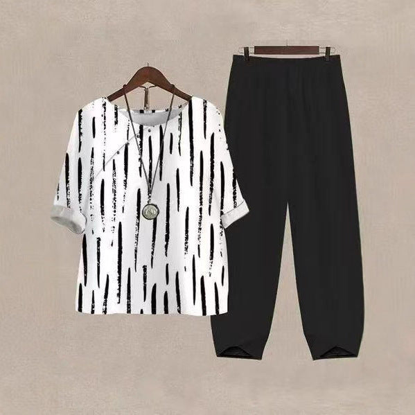 Dame nan lette fritidssæt med mønstret oversized skjorte og konisk tætsiddende komfortbukser Skovae