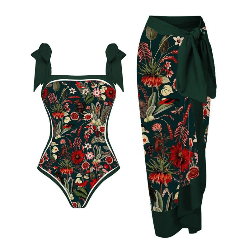 Dame one-piece badedragt med elegant indpakningsskørt og modige remme Skovae