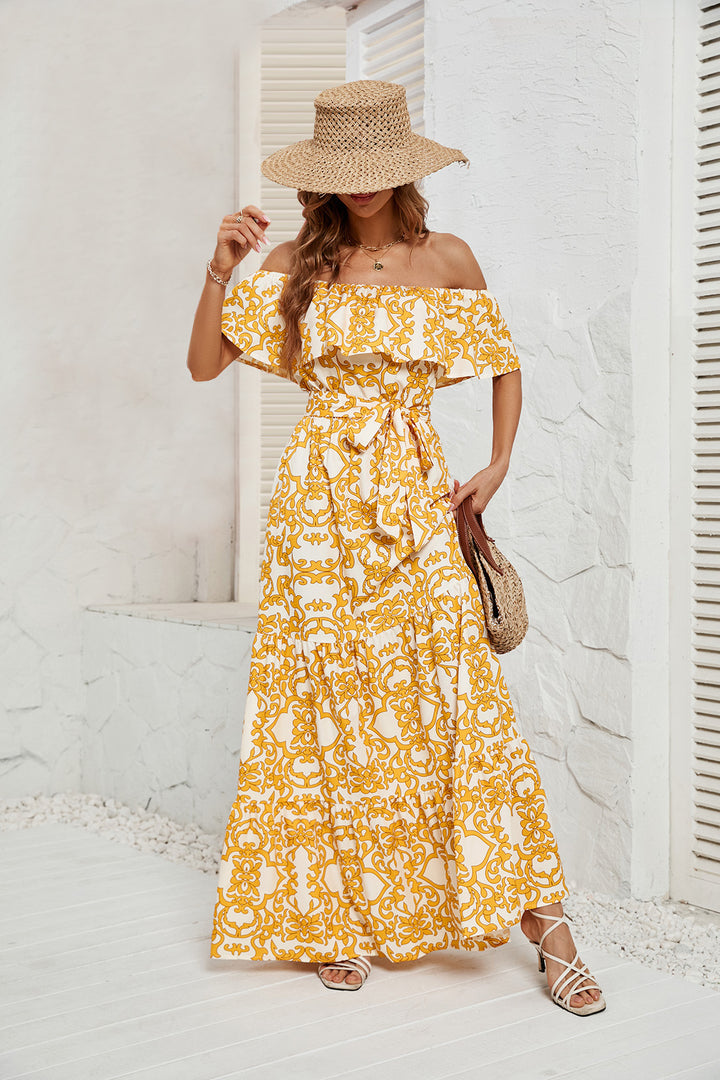 Dame Maxikjole med off-shoulder design og voluminøs flæsekant Stilla