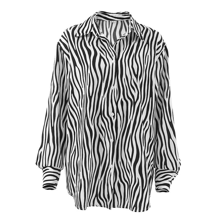 Damebluse med zebra-print og moderne snit Stilla