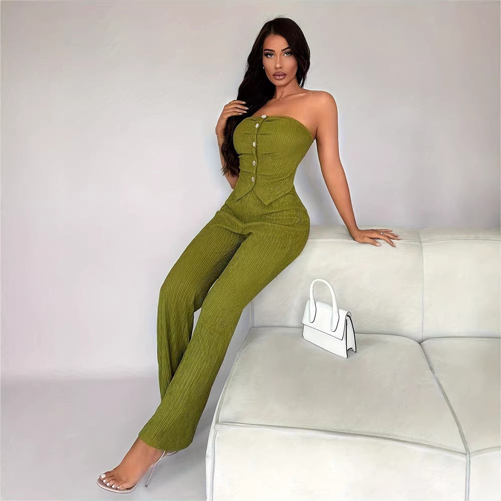 Dame elegant jumpsuit med tætsiddende snit og knapdetaljer Skovae