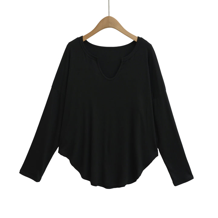 Dame afslappet longsleeve top med dyb v-hals og løstsiddende snit Stilla