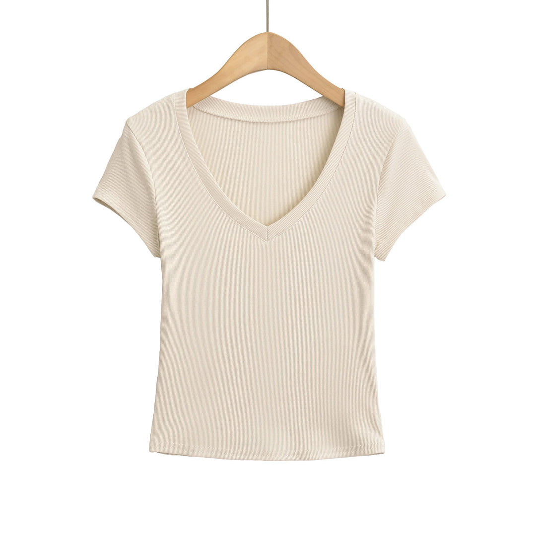 Dame cropped V-hals T-shirt i ribdesign med tætsiddende snit og korte ærmer Stilla