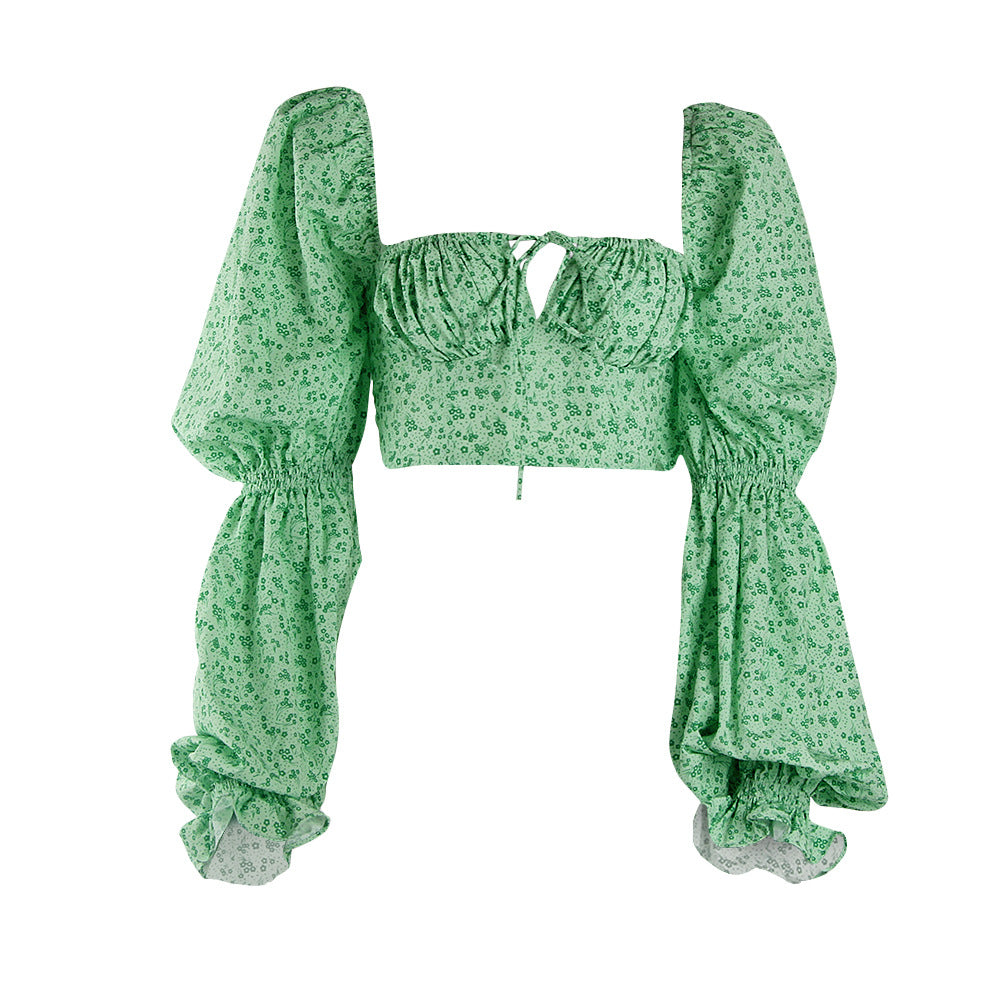 Damebluse med puffede ærmer og blomsterdesign Stilla