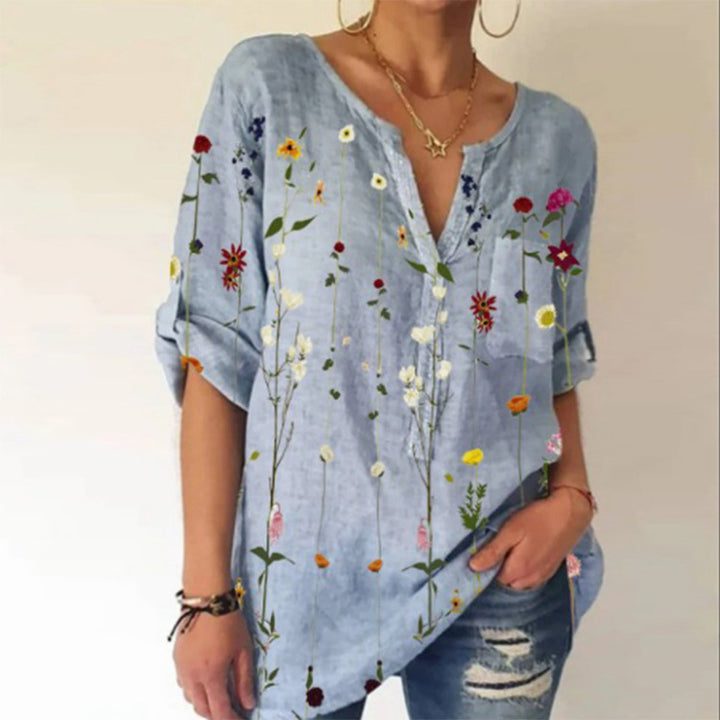 Damebluse med floral broderedesign og V-hals Stilla