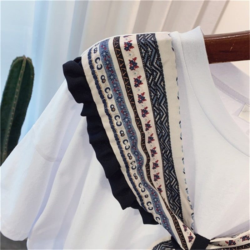 Dame Casual T-shirt med dekorativ bue og flæsedetalje Stilla