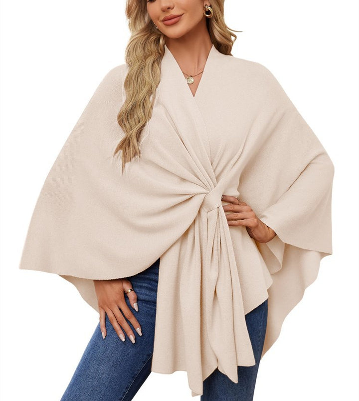 Dame elegant strikkeponcho med raffinerede draperinger og taljebælte Stilla