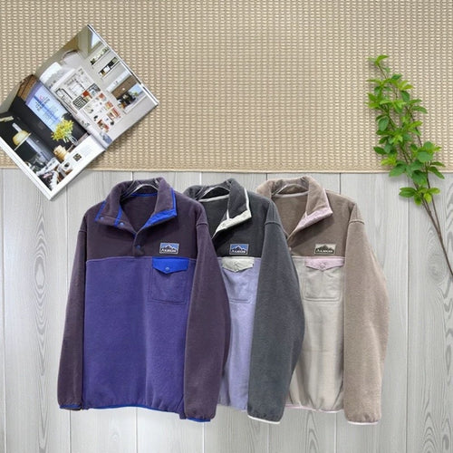 Women's fleece pullover with high collar and practical pockets Stilla