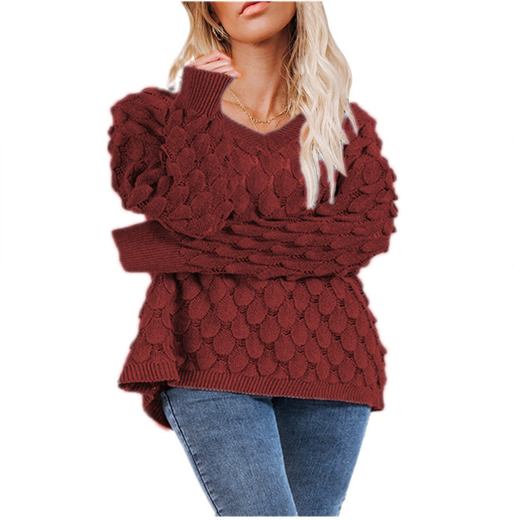 Kvinders chunky strikket sweater med skulpturel bølgemønster og V-hals Stilla