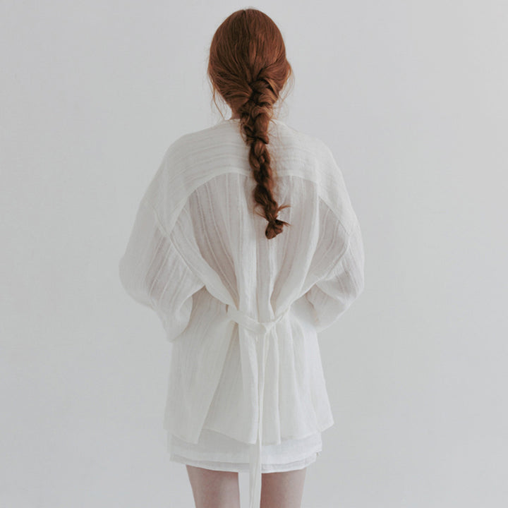 Dame Elegant og afslappet linnedbluse med knaplukning og struktureret design Stilla