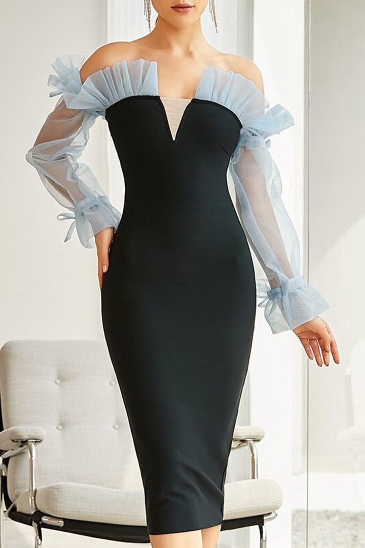 Kvinders figursyet cocktailkjole med transparente puffærmer og elegant v-hals