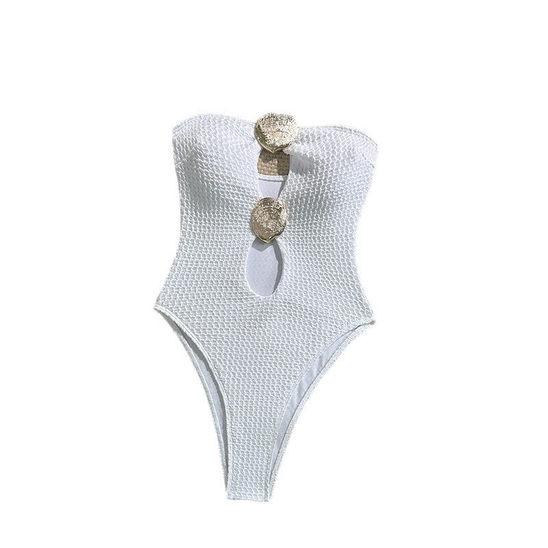 Dame badedragt med raffineret cut-out-design og gyldne accenter Skovae