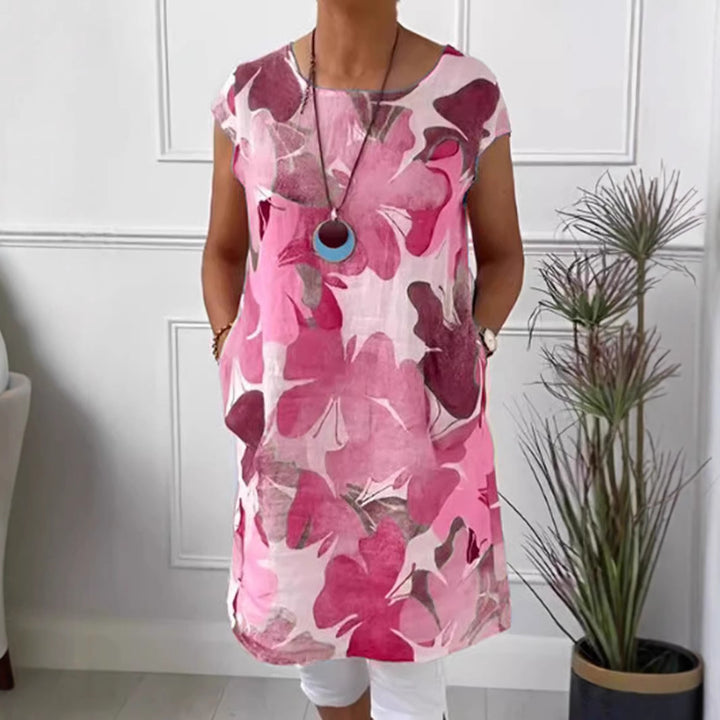 Dame nan let tunika-midi kjole lavet af linnedmix med akvarelblomsterprint og sidelommer Skovae