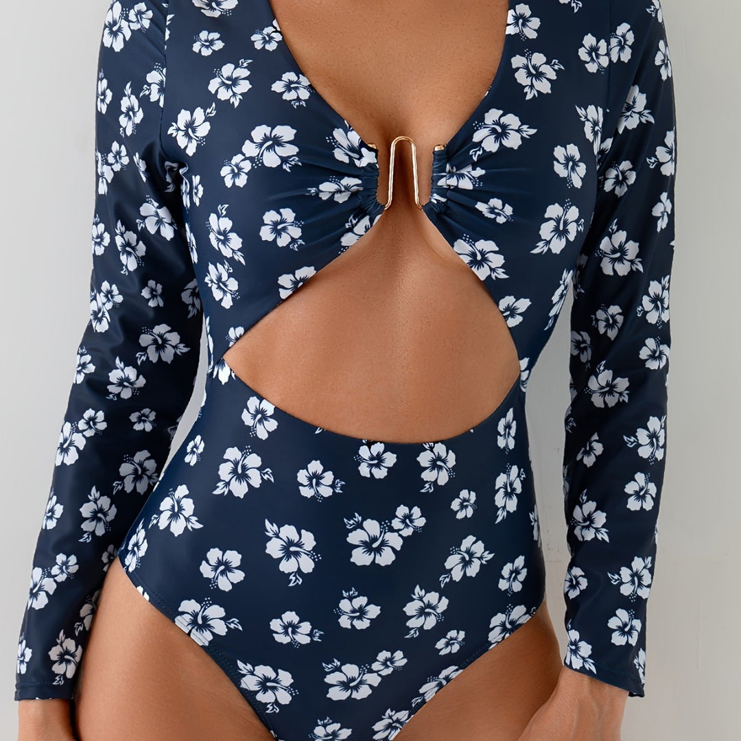 Dame én deler badedragt med floralt cut-out og dekorativ twist Stilla