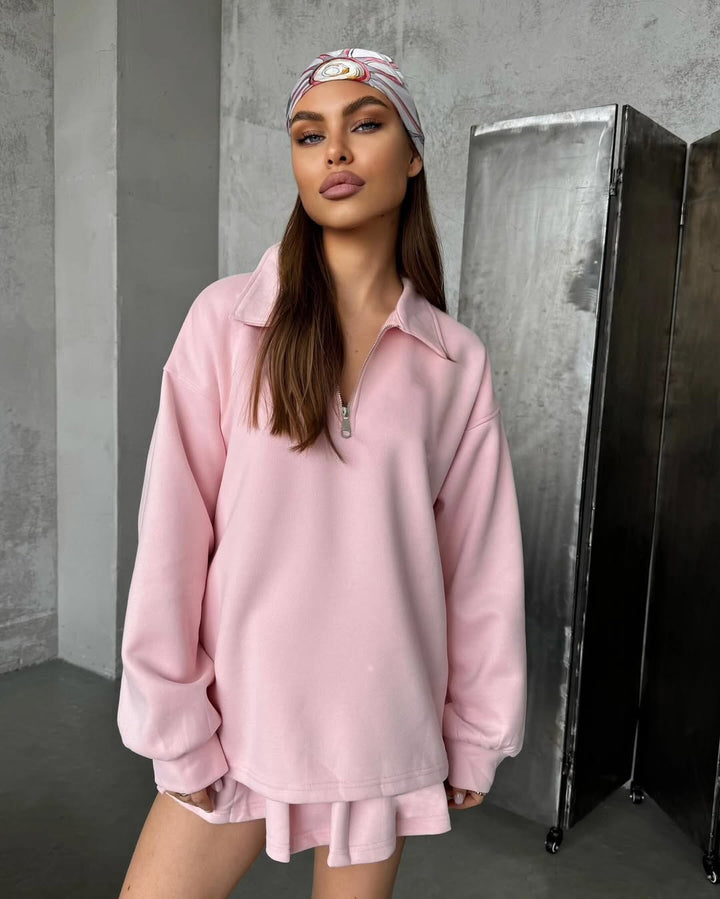 Dame sporty oversized pullover med kort lynlås og ribbede detaljer Skovae