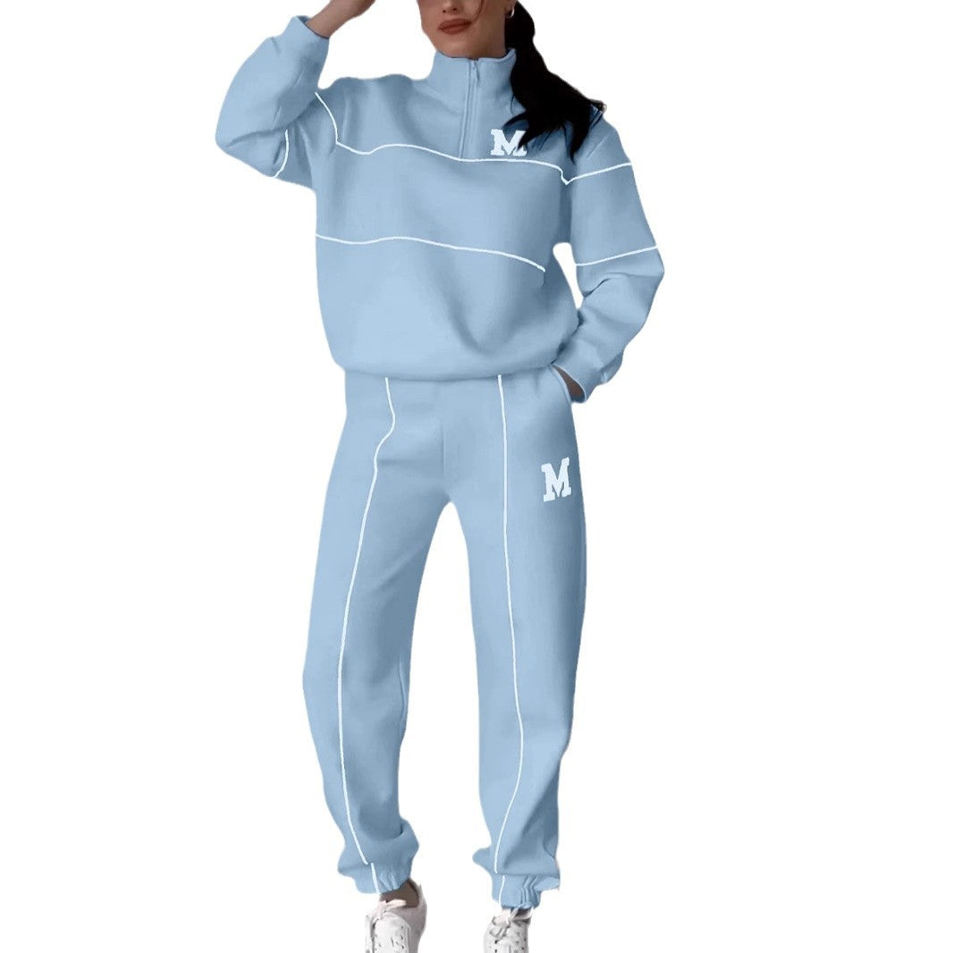 Kvinders sporty loungewear-sæt med halv lynlås og elastisk talje Stilla
