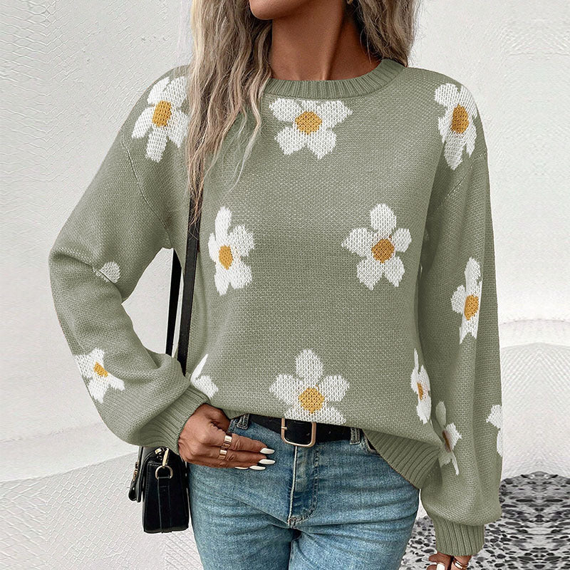 Dame strikbluse med florale accenter og løs pasform Stilla