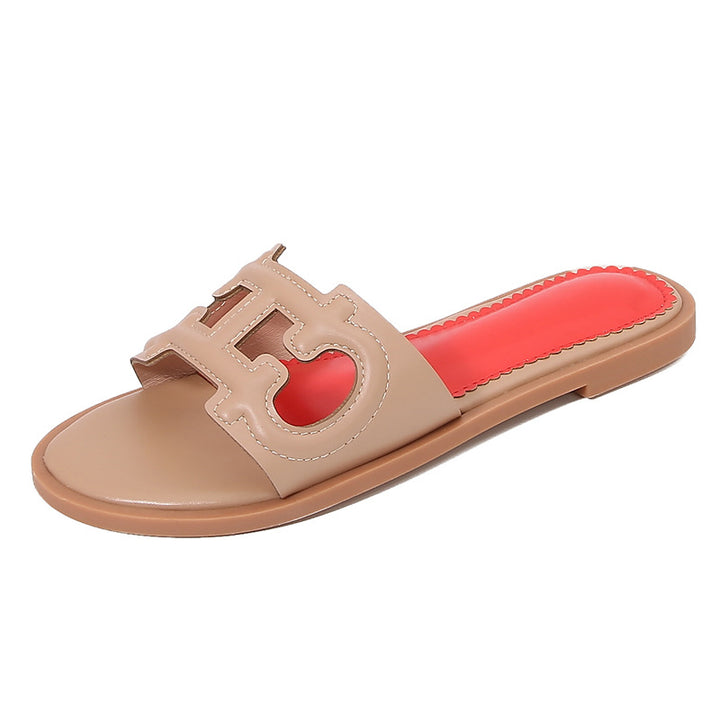 Dame mode slippers med iøjnefaldende logo Stilla