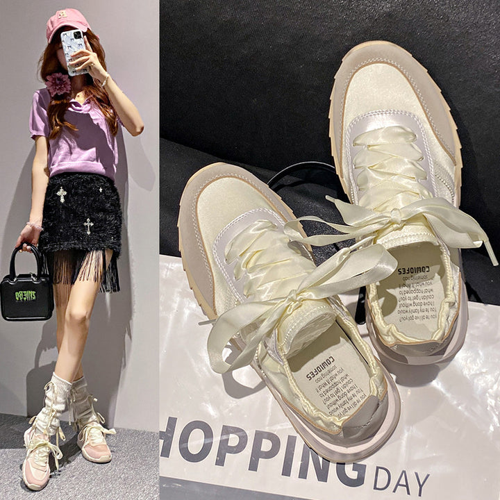 Dame sneakers i modern blanding af sport og elegance med luksuriøse satinsnørebånd Stilla