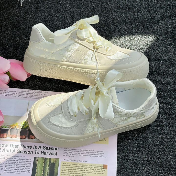 Dame modische Sneakers med glitrende overdel og elegante satin snørebånd Stilla