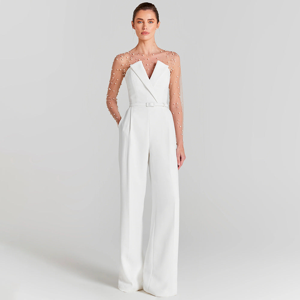 Damer elegant jumpsuit med gennemsigtige ærmer og perledekor Skovae
