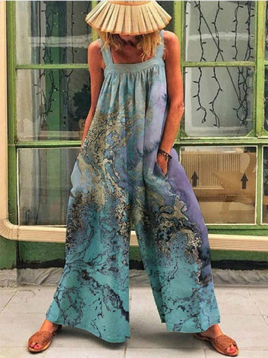 Kvinde luftig Jumpsuit med farverigt blomsterprint og praktiske sidelommer Stilla