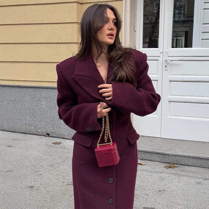 Dame elegant uldfrakke med struktureret design og praktiske lommer Stilla