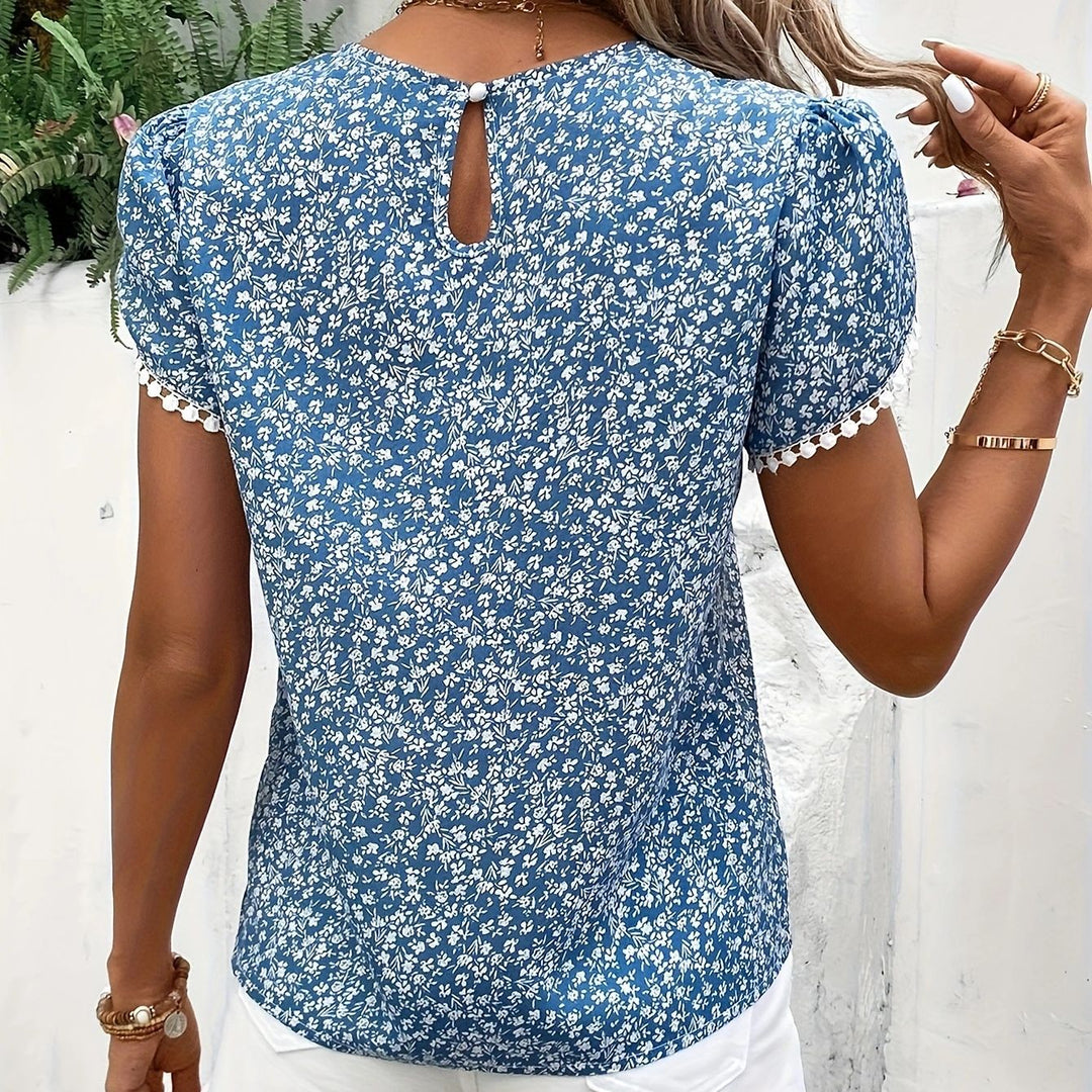 Dame blomsterprintet kortærmet bluse med puffærmer Stilla