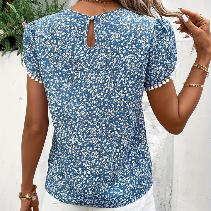 Dame blomsterprintet kortærmet bluse med puffærmer Stilla