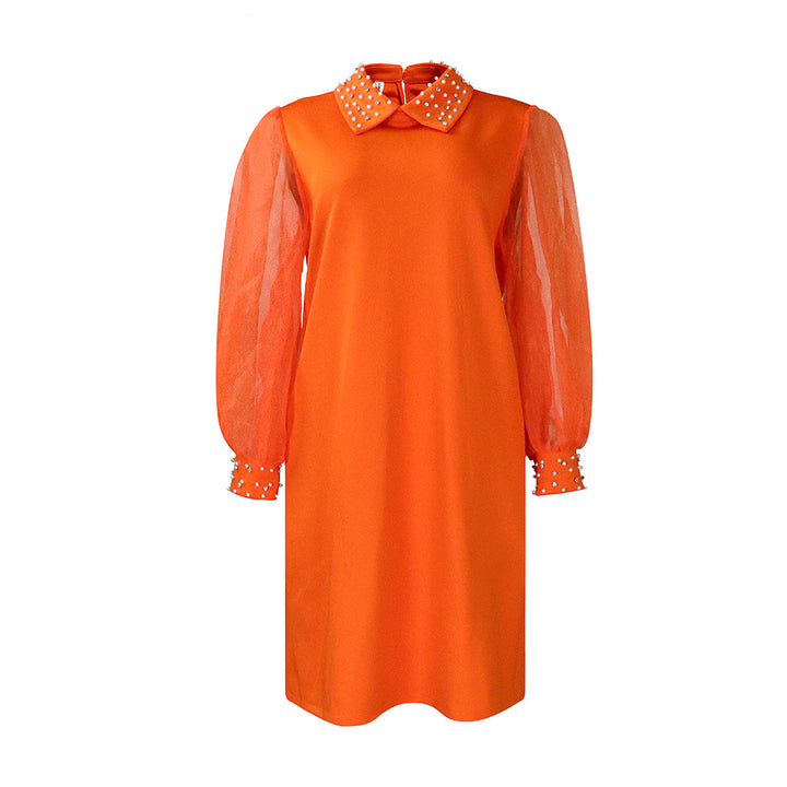 Damekjole med transparente ærmer og elegante perledetaljer Stilla