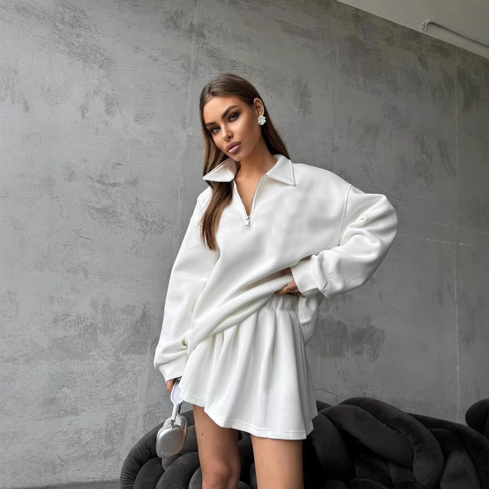 Dame sporty oversized pullover med kort lynlås og ribbede detaljer Skovae