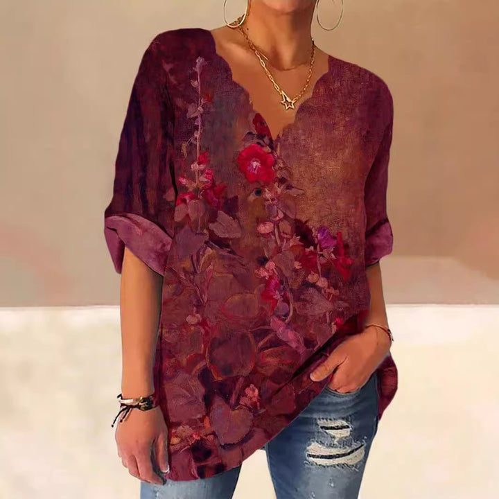 Dame V-hals bluse med kunstnerisk blomsterdesign og løs pasform Stilla