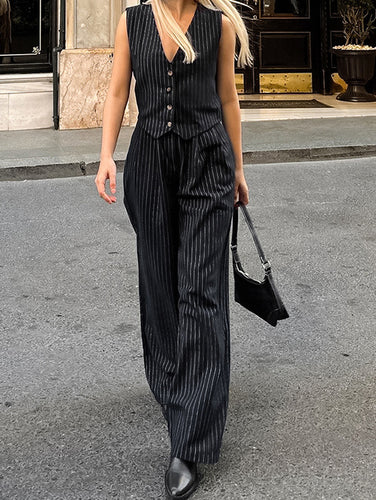Dame jakkesæt-jumpsuit med smal pasform og figursyet design Stilla